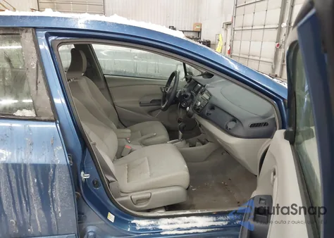 2010 Honda Insight Ex z USA, uszkodzony, nr VIN JHMZE2H74AS032248